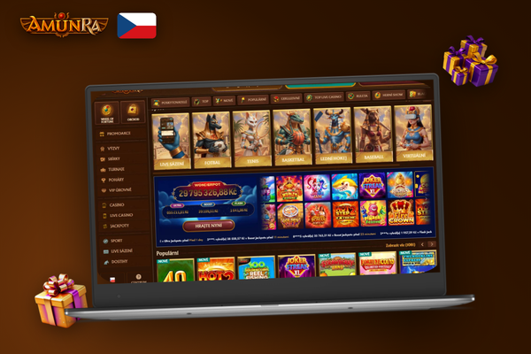 Notebook a smartphone zobrazující AmunRa Casino – srovnání desktopové a mobilní verze